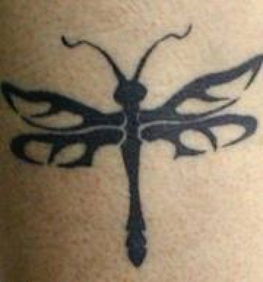Black Tribal Dragonfly Tattoo Idea