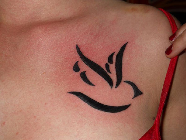 Black Tribal Flying Dove Tattoo On Front Shoulder