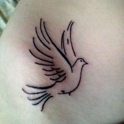 Black Tribal Outline Flying Small Dove Tattoo On Hip