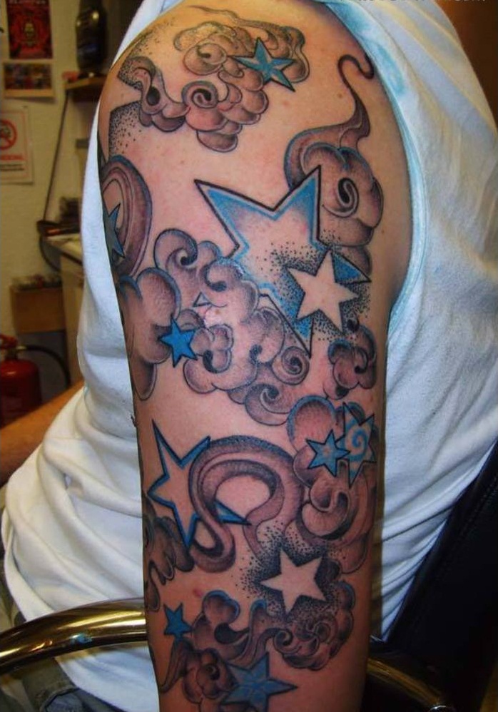 Blue And Grey Stars With Clouds Tattoo On Half Sleeve
