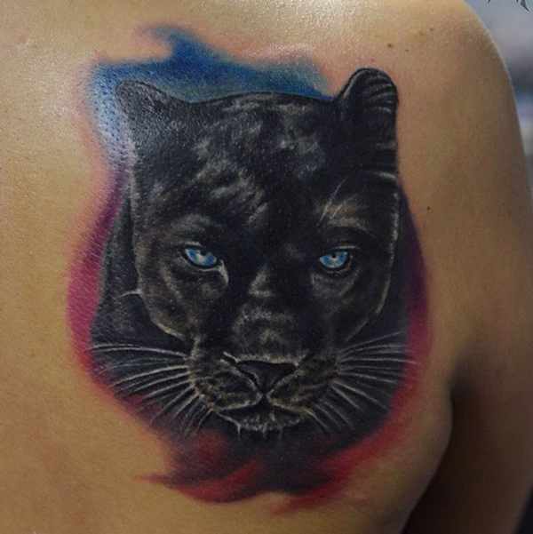 Blue Eyes Black Panther Head Tattoo On Back Shoulder
