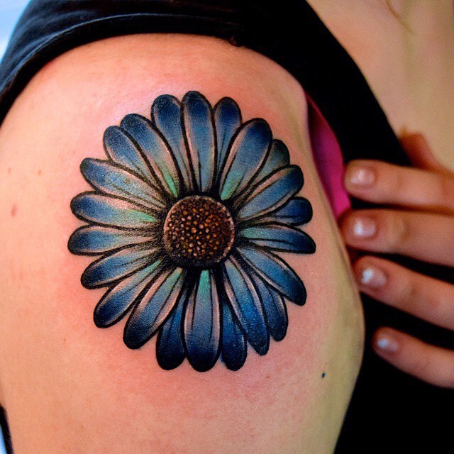 Blue Ink Daisy Flower Tattoo On Girl Right Shoulder