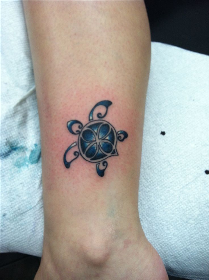 Blue Ink Turtle Tattoo On Girl Side Leg