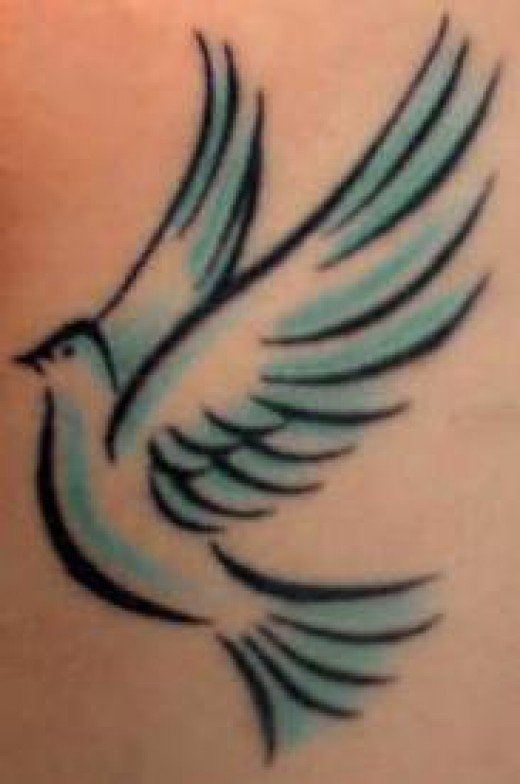Blue Tribal Flying Dove Tattoo
