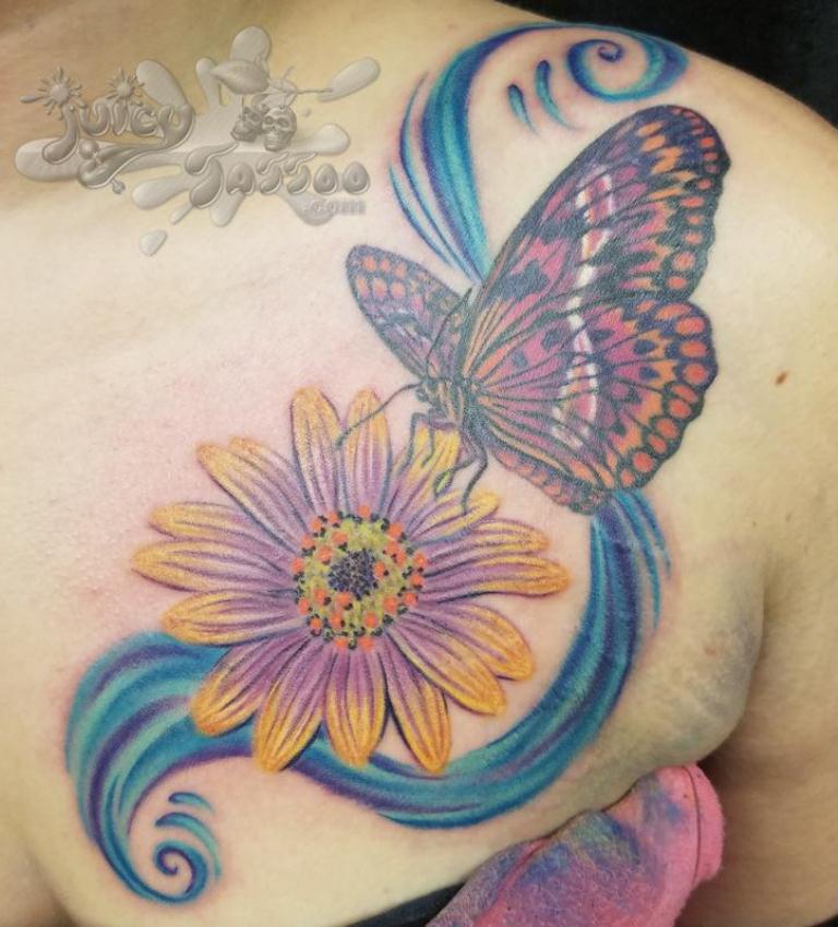 Butterfly And Daisy Flower Tattoo On Girl Front Shoulder