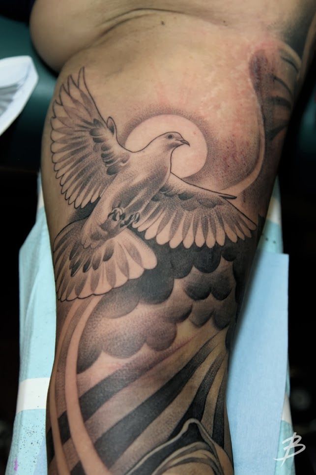 Clouds And Flying Dove Tattoo
