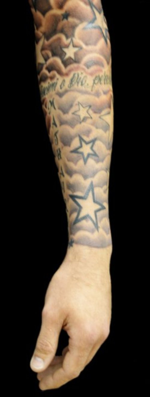 Clouds and Star Tattoo On Left Sleeve