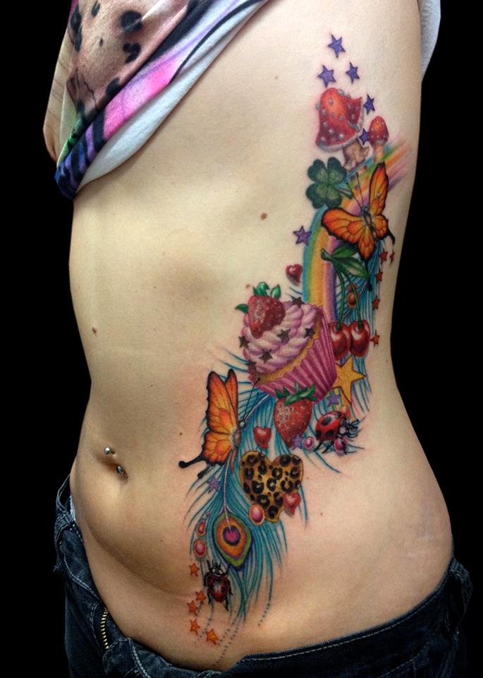 Colored Butterflies And Cupcake Tattoo On Side Rib
