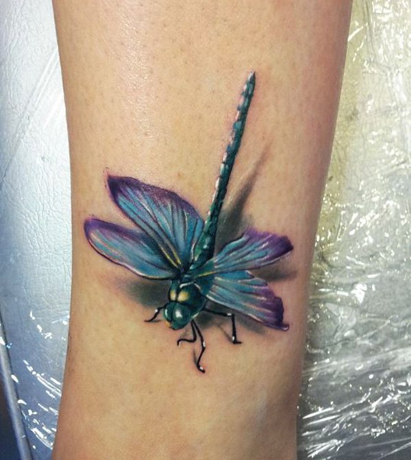 Colored Dragonfly Tattoo On Side Leg