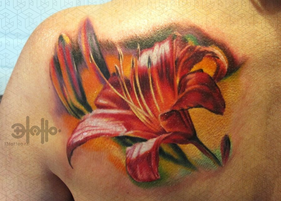 Colored Lily Flower Tattoo On Left Back Shoulder