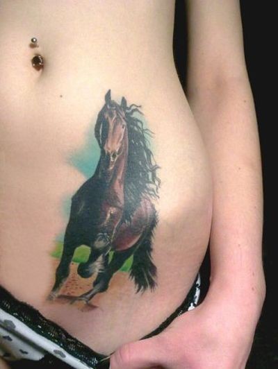 Colored Running Horse Tattoo On Girl Left Hip