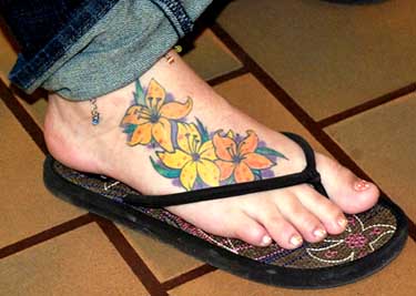 Colorful Lily Tattoos On Foot