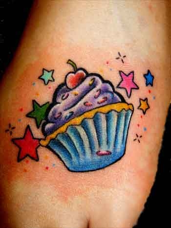 Colorful Stars And Cupcake Tattoo On Left Foot