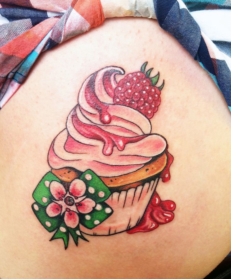 Cupcake Tattoo On Girl Rib Side