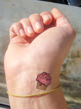 Cupcake Tattoo On Girl Right Wrist