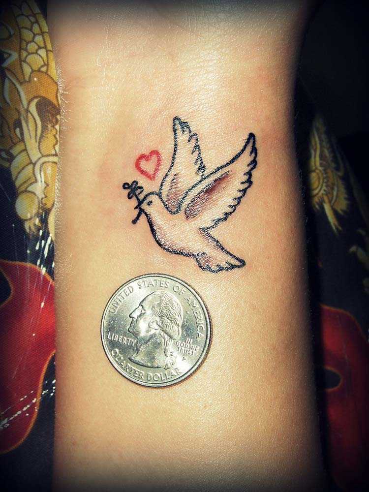 Cute Small Peace Dove Tattoo On Wrist