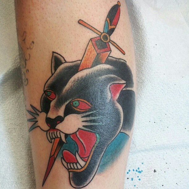 Dagger In Traditional Panther Head Tattoo On Leg