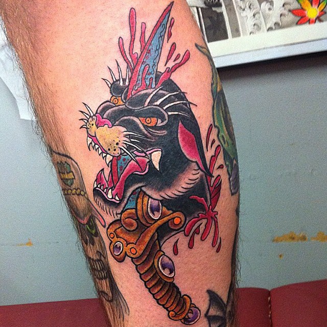 Dagger In Traditional Panther Tattoo On Side Leg