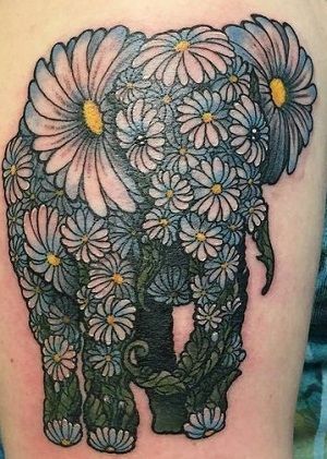 Elephant Made With Daisy Flowers Tattoo On Arm
