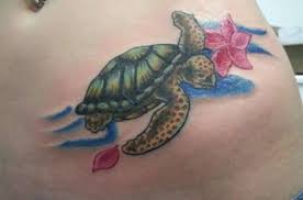 Flowers And Turtle Tattoo On Left Hip