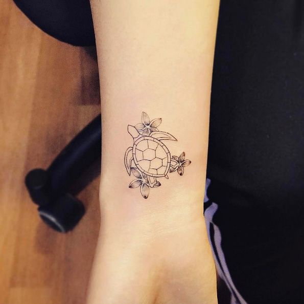 Flowers And Turtle Tattoo On Right Wrist