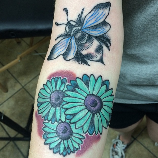 Flying Bee And Daisy Flowers Tattoos On Right Forearm