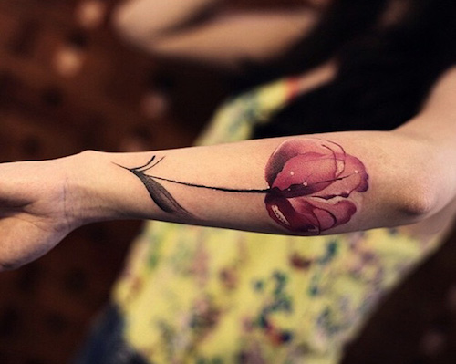 Girl With Tulip Flower Tattoo On Left Arm Sleeve