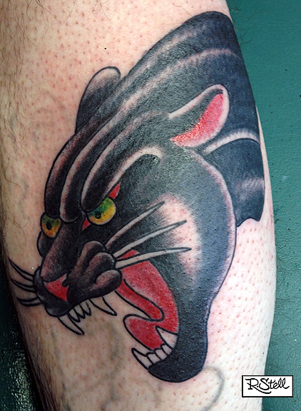 Green Eyes Angry Panther Head Tattoo On Leg