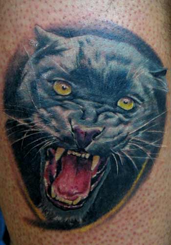 Green Eyes Angry Panther Head Tattoo