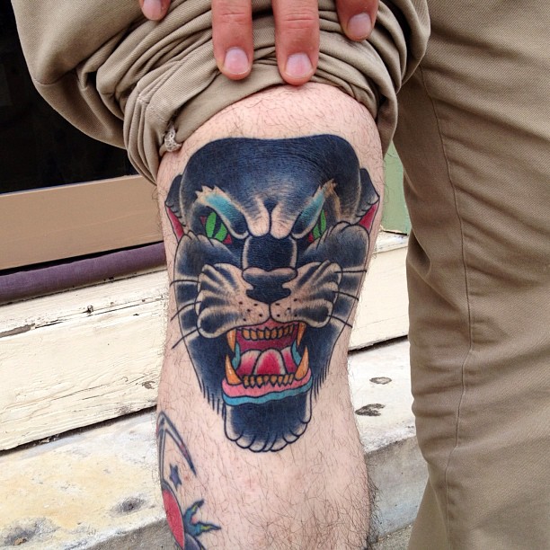 Green Eyes Panther Head Tattoo on Leg