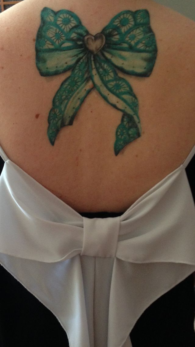 Green Lace Bow Tattoo On Back