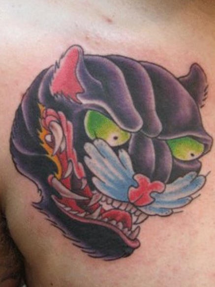 Green eyes Panther Head Tattoo On Chest