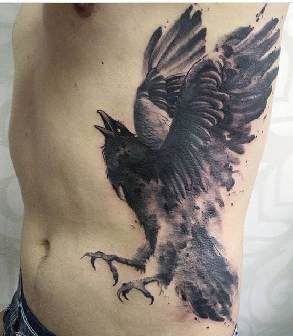 Grey And Black Flying Raven Tattoo On Left Side Rib