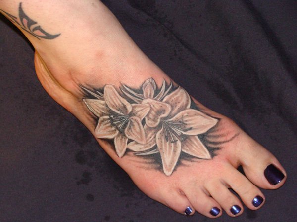 Grey And Black Lily Flowers Tattoos On Right Foot