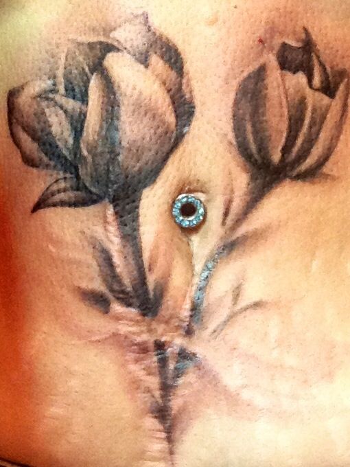 Grey And Black Tulip Flowers Tattoo On Side Rib