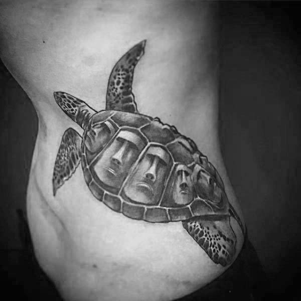 Grey And Black Turtle Tattoo on Man Rib side