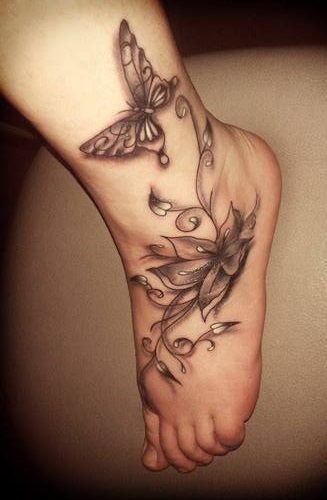 Grey Butterfly And Lily Tattoo On Left Foot