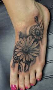 Grey Daisy Flowers Tattoo On Girl Left Foot