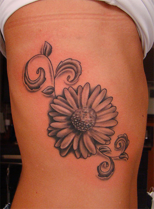 Grey Ink Daisy Flower Tattoo On Rib Side