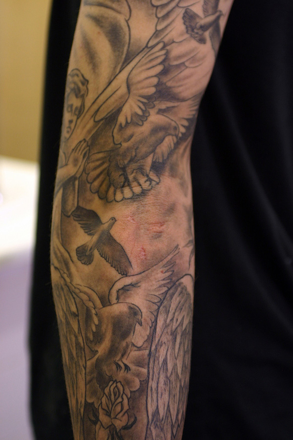 Grey Ink Flying Peace Dove Tattoos On Arm Sleeve