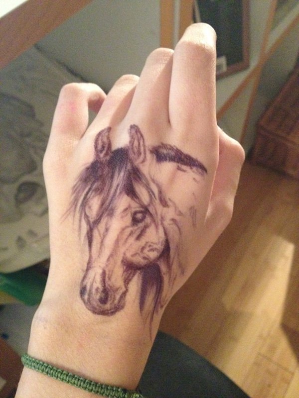 Grey Ink Horse Head Tattoo On Left Hand