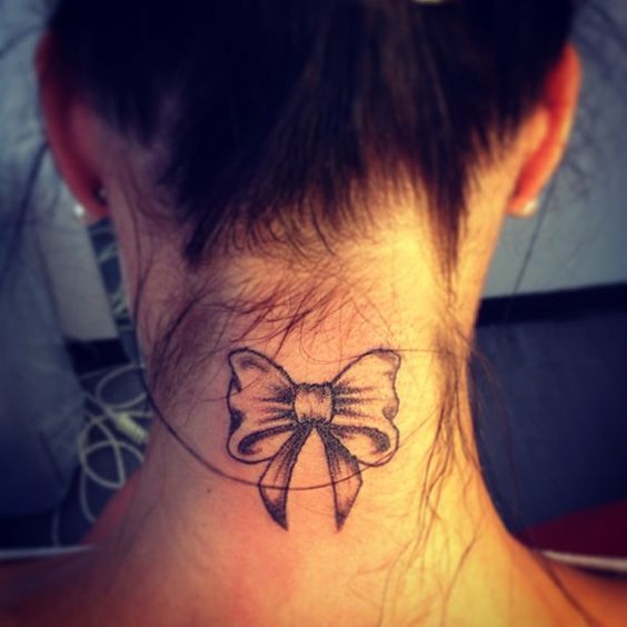 Grey Ink Nape Bow Tattoo For girls