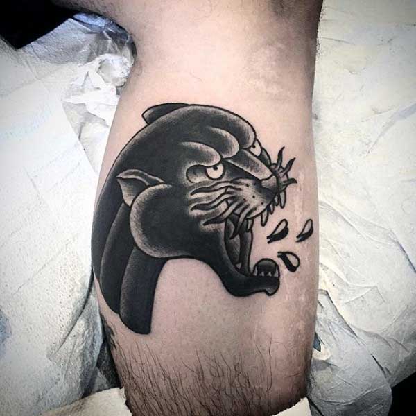 Grey Ink Panther Head Tattoo On Leg