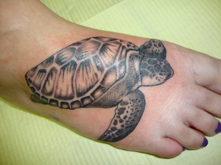 Grey Ink Turtle Tattoo On Right Foot