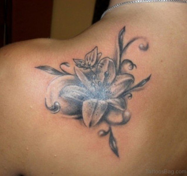 Grey Realistic Lily Tattoo On Left Back Shoulder