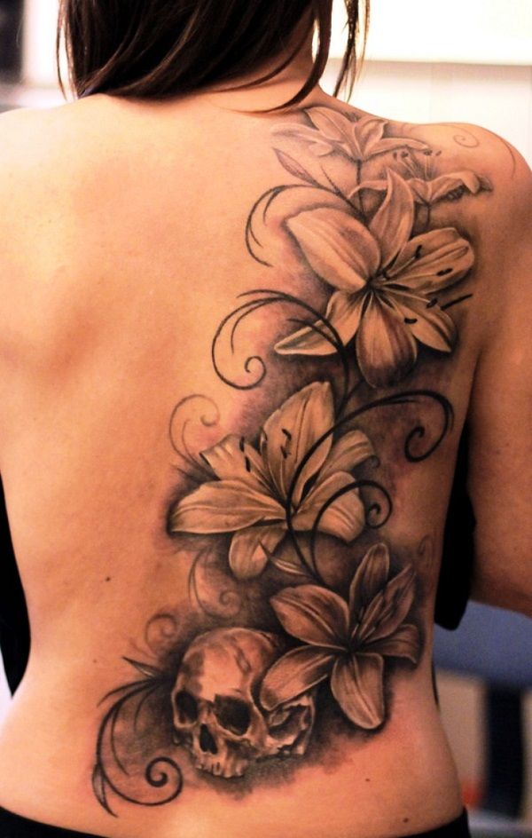 Grey Skull And Lily Tattoo On Back Shoulder