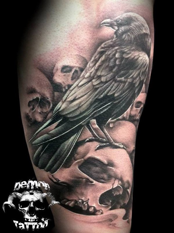 Grey Skulls And Raven Tattoos On Leg