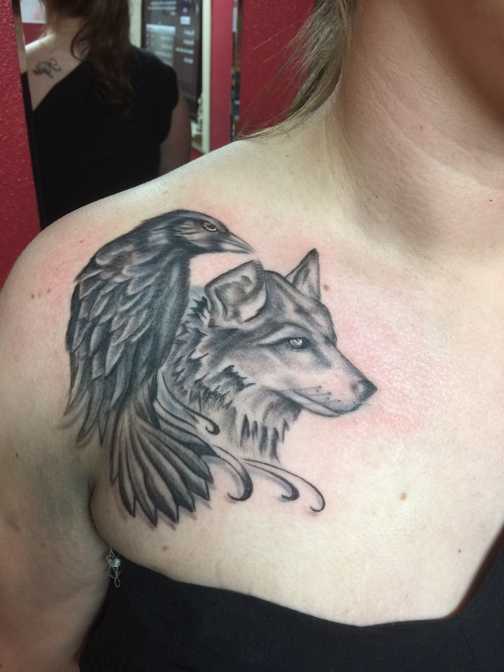 Grey Wolf Head And Black Raven Tattoo On Front Shoulder