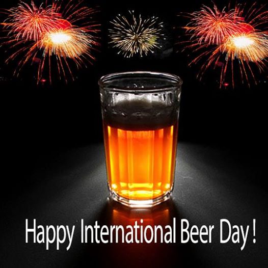 Happy International Beer Day Beer In Glass Fireworks In Background