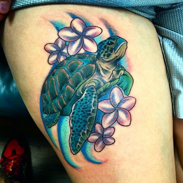 Hawaiian Flowers And Blue Turtle Tattoo On Side Thigh